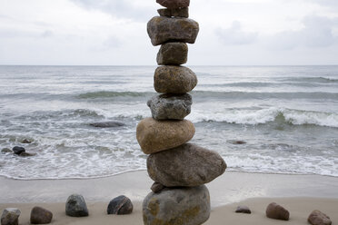 Germany, Mecklenburg-Vorpommern, Island Rügen, Pile of stones on beach - WDF00179