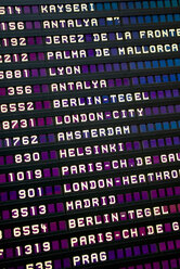 Flight arrival and departure board in airport, full frame - MUF00677