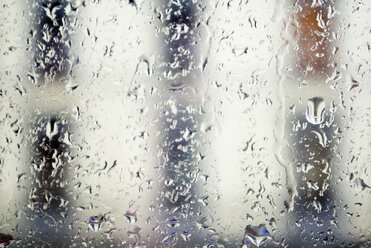 Raindrops on window, close-up - MUF00646