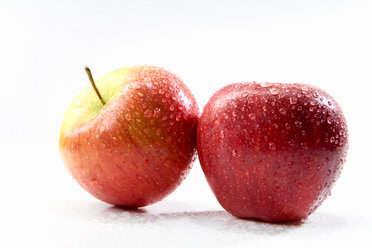 Three Red Apples On A Food Scale On A White Background Stock Photo, Picture  and Royalty Free Image. Image 6768478.