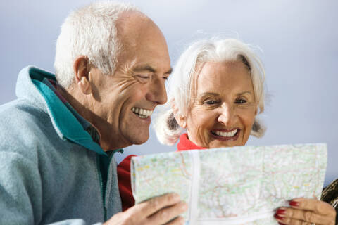 Germany, Bavaria, Walchensee, Senior couple looking at map stock photo