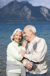 Germany, Bavaria, Walchensee, Senior couple smiling, portrait - WESTF10135