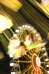 Germany, Bavaria, Munich, Oktoberfest, Ferris wheel at night - GNF01093