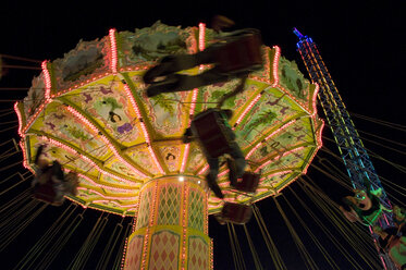 Germany, Bavaria, Munich, Oktoberfest, Carrousel at night - GNF01092