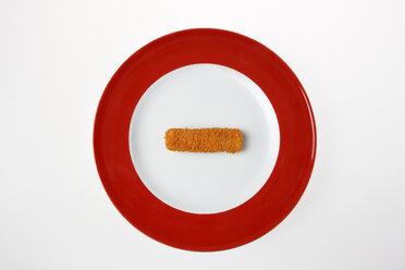 Fish finger on plate, elevated view - KSWF00298