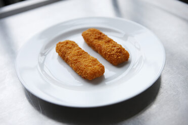 Fish fingers on plate - KSWF00277