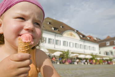 Germany, Baden-Württemberg, Überlingen, Little girl (2-3) eating ice cream - SHF00272