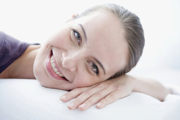 Young woman smiling, portrait, close-up - WESTF10958