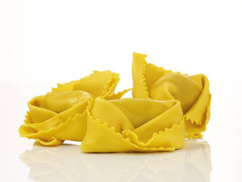 Uncooked Tortellini, close-up stock photo