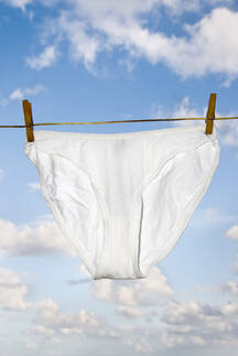 Underwear pegged on clothesline stock photo