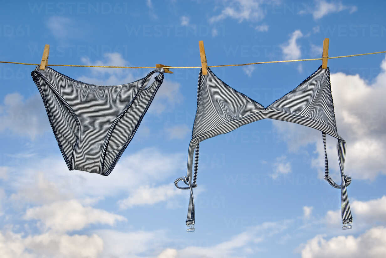 Underwear hanging on clothesline stock photo