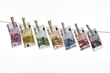 Different Euro bank notes hanging on clothesline - 10656CS-U