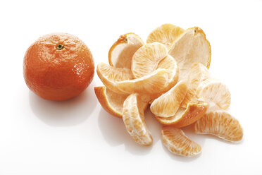 Scheiben von Mandarinen (Citrus × aurantium), Ansicht von oben - 10526CS-U
