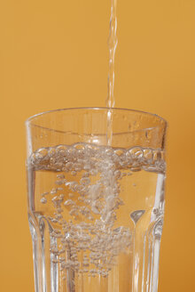 Water being poured into glass, close up - KJF00032