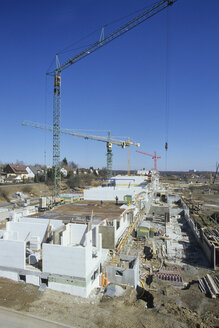 Germany, Building site, Shell with cranes - WDF00470