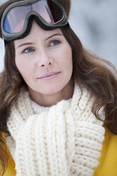 Germany, Bavaria, Woman with ski goggles, portrait - MAEF01751