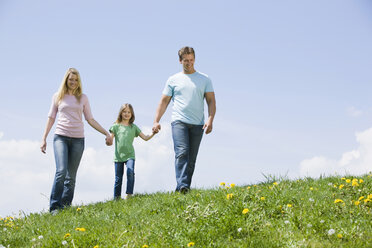 Germany, Bavaria, Munich, Family taking a walk, holding hands - CLF00727