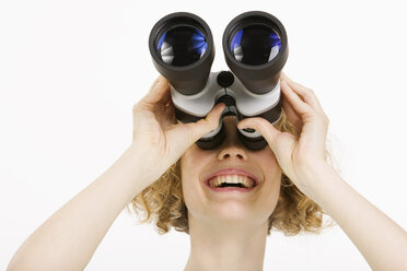 Woman using binoculars, close-up - CLF00831