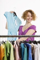 Young woman clothing shopping, portrait - CLF00789