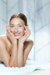 Germany, Bavaria, Munich, Young woman in spa, portrait - WESTF11938