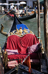 Italy, Venice, Gondola decoration, Gondolier in background - PSF00324