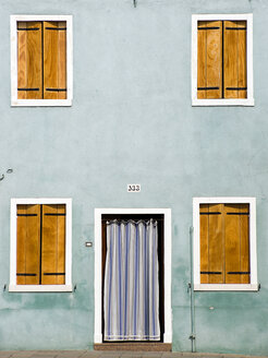 Italy, Venice, Burano, House facade, closed shutters, Front door with curtain - PSF00313