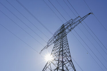 Germany, Bavaria, Electricity pylon, low angle view - RUEF00261