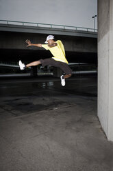 Germany, Cologne, Young man jumping - SK00048