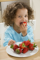 Girl (2-3) eating strawberries, portrait - LDF00685