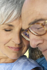 Senior couple, eyes closed, portrait, close-up - WESTF12934