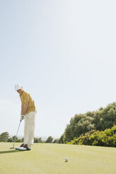 Spain, Mallorca, Senior man playing golf, side view - WESTF12856