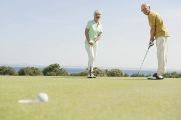 Spain, Mallorca, Senior couple playing golf - WESTF12847