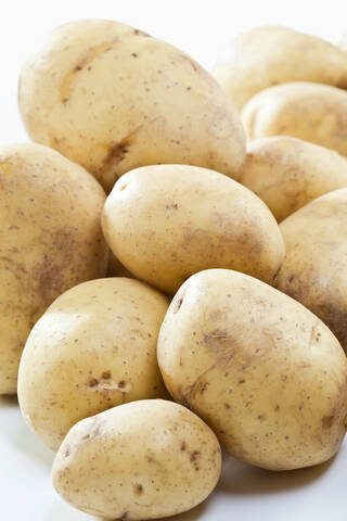 Raw potatoes, close-up stock photo