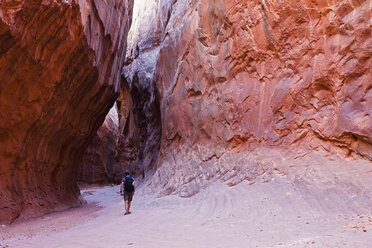 USA, Utah, Leprechaun Canyon, Hiker in a Slot Canyon, rear view - FOF01689