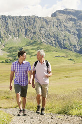 Italy, Seiseralm, Two hikers - WESTF13408