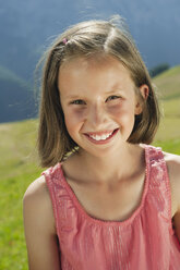Italy, South Tyrol, Girl (10-11) smiling, portrait, close-up - WESTF13669