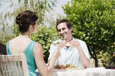 Italy, South Tyrol, Couple in restaurant having lunch - WESTF13794