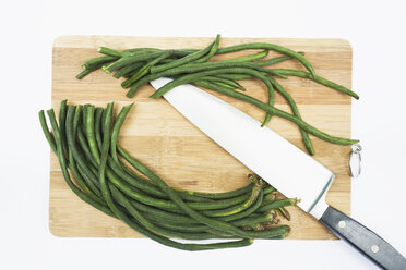 Asparagus beans on chopping board, elevated view - GWF01081