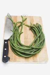 Asparagus beans on chopping board - GWF01080