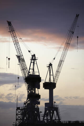 Germany, Hamburg, Cranes in Harbor stock photo