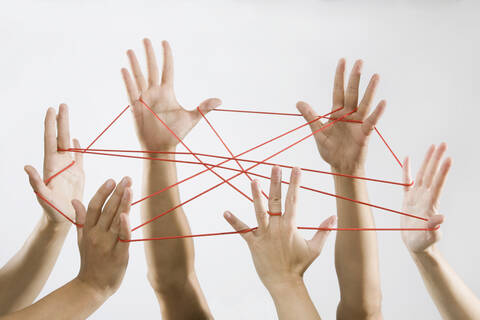 People playing cat's cradle stock photo