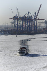 Germany, Hamburg, Ice breaker moving ahead breaking ice sheet - THF01101