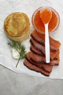 Blinis, Horseradish, dill and trout caviar in small bowl, elevated view - SCF00416