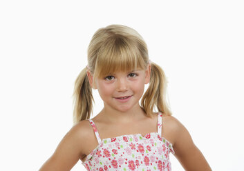 Girl (4-5) against white background, smiling, portrait - WWF01226