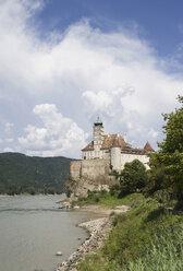 Austria, Wachau, View of castle by danube river - WWF01211