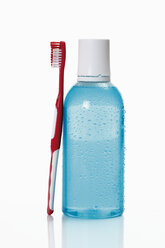 Toothbrush and mouthwash on white background - 12303CS-U