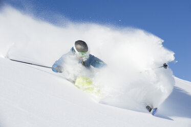 Austria, Man skiing on arlberg mountain - MIRF00059