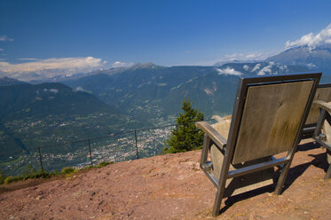 Italy, South Tyrol, Meran, View of village with mountain from platform - SMF00601