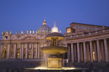 Italy, Rome, Vatican, A view of st peter's basilica with fountain - GWF01150