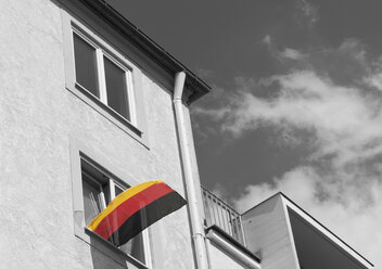 Germany, Bavaria, Munich, German flag on window - LFF00155